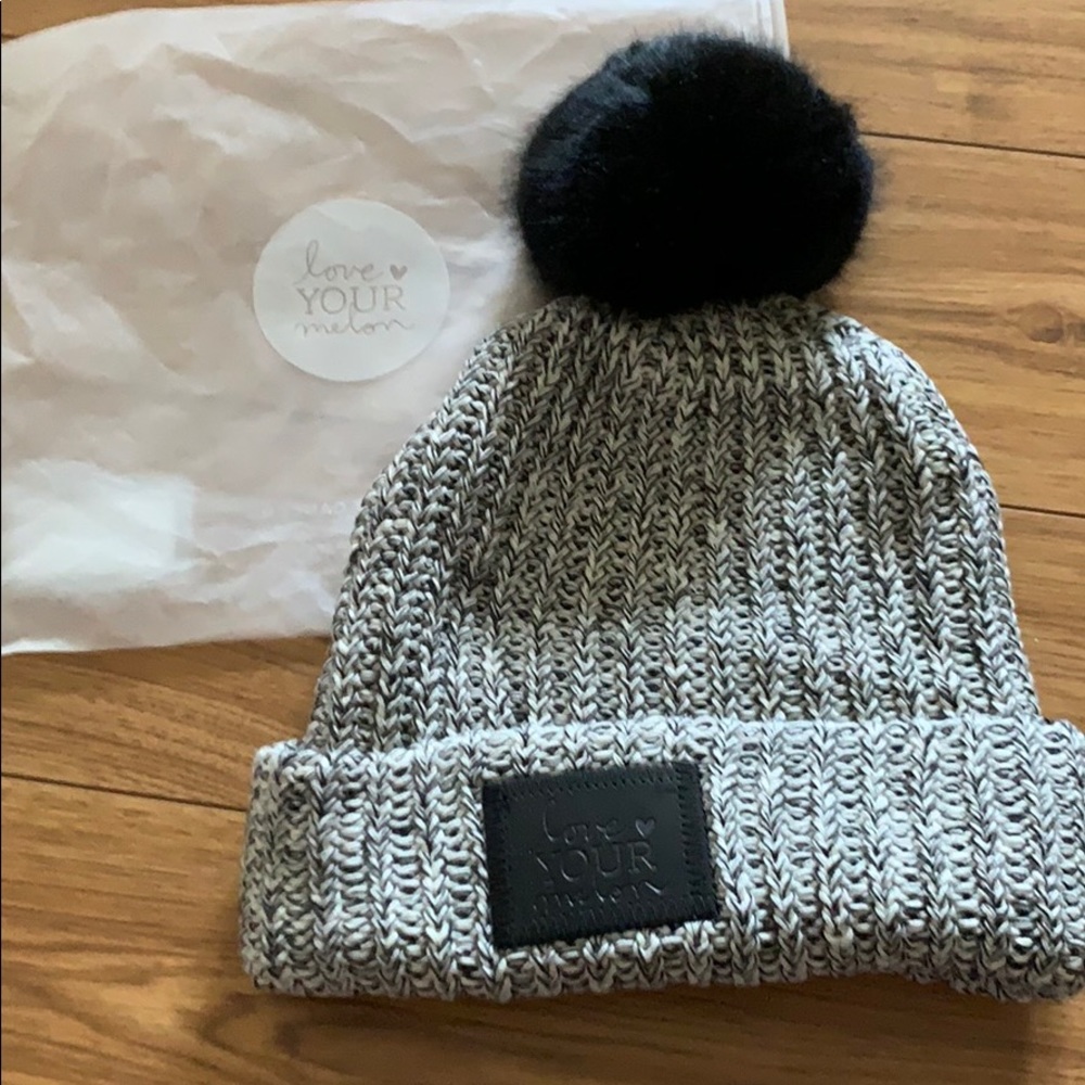Brand new: Love your melon black Pom beanie